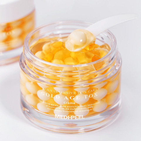 Crema antiedad en cápsulas con extracto de gusano de seda dorado MEDIPEEL Gold Age Tox Cream  50 ml